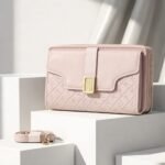 Luxe Quilted Zippered Clutch With Signature Metallic Clasp And Crossbody Strap