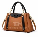 Structured Satchel With Contrast Panel Accents And Polished Hardware