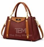 Structured Satchel With Contrast Panel Accents And Polished Hardware