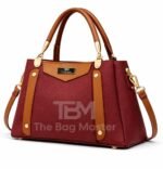 Structured Satchel With Contrast Panel Accents And Polished Hardware