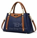 Structured Satchel With Contrast Panel Accents And Polished Hardware