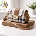 Heritage Plaid Flap Bag With Iconic Gold Tone Clasp And Chain Link Strap