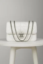 Quilted Flap Crossbody Bag With Circular Push-Lock And Dual Chain Strap