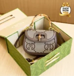 Monogram Saddle Bag With Bamboo Handle And Iconic Twist-Lock