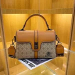Signature Patterned Leather Crossbody Bag With Wide Strap