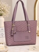 Patterned Handbag With Tassel Charm