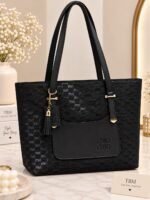 Patterned Handbag With Tassel Charm
