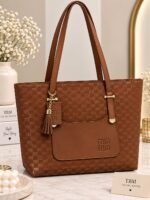 Patterned Handbag With Tassel Charm