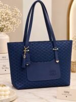 Patterned Handbag With Tassel Charm