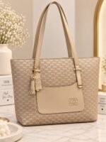 Patterned Handbag With Tassel Charm