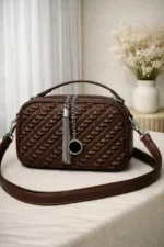 Woven Ruched Crossbody Bag With Metallic Tassel Charm And Dual Handles
