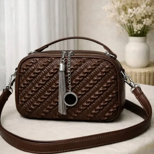 Woven Ruched Crossbody Bag With Metallic Tassel Charm And Dual Handles