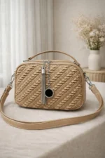 Woven Ruched Crossbody Bag With Metallic Tassel Charm And Dual Handles