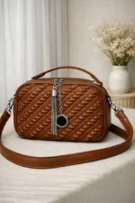 Woven Ruched Crossbody Bag With Metallic Tassel Charm And Dual Handles