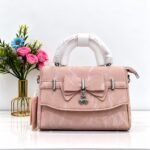 Marble Textured Crossbody Bag with Bow & Clover Charm Accent - Image 5