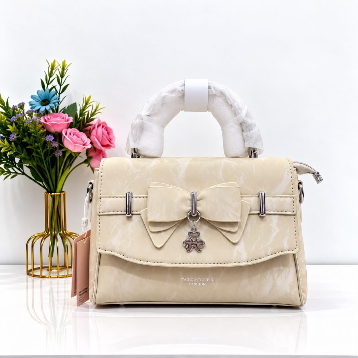 Marble Textured Crossbody Bag with Bow & Clover Charm Accent - Image 2