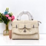 Marble Textured Crossbody Bag with Bow & Clover Charm Accent - Image 2
