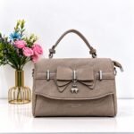 Marble Textured Crossbody Bag with Bow & Clover Charm Accent - Image 4