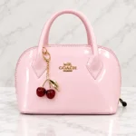 Patent Leather Dome Satchel Handbag With Cherry Charm - Image 10