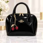 Patent Leather Dome Satchel Handbag With Cherry Charm - Image 9
