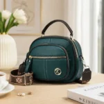 Domed Multi-Pocket Crossbody Bag